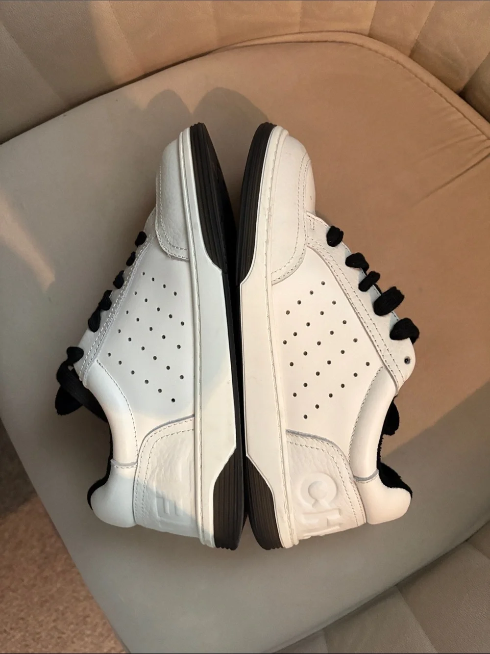 CHANEL White Leather Sneakers with Black Accents